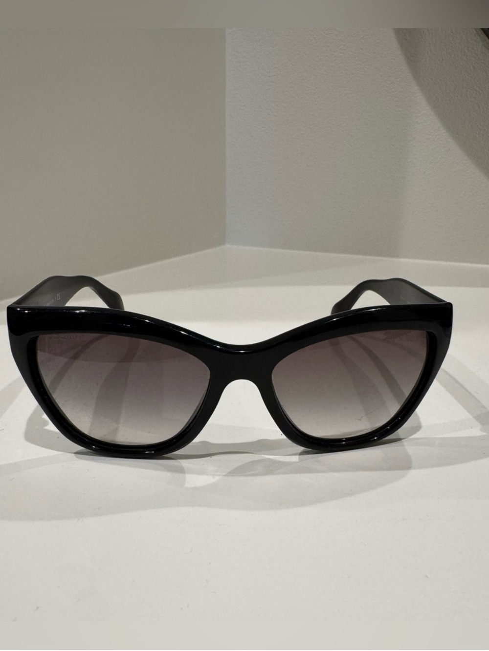 Prada Black Cat-Eye Sunglasses with Gradient Lenses